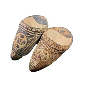 Replica of 1930s carved and painted shoes